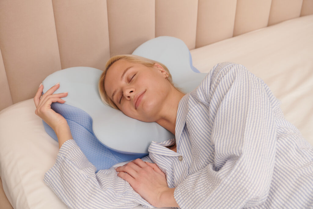 Derila ergonomic pillow styled in a bedroom