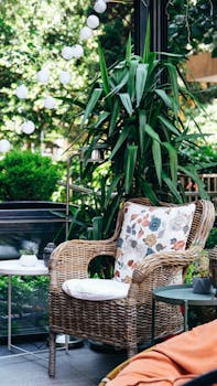 Outdoor patio with faux plants and cozy decor