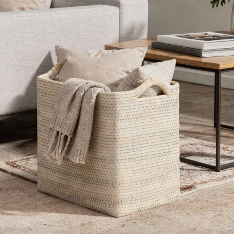 Woven basket for books and blankets