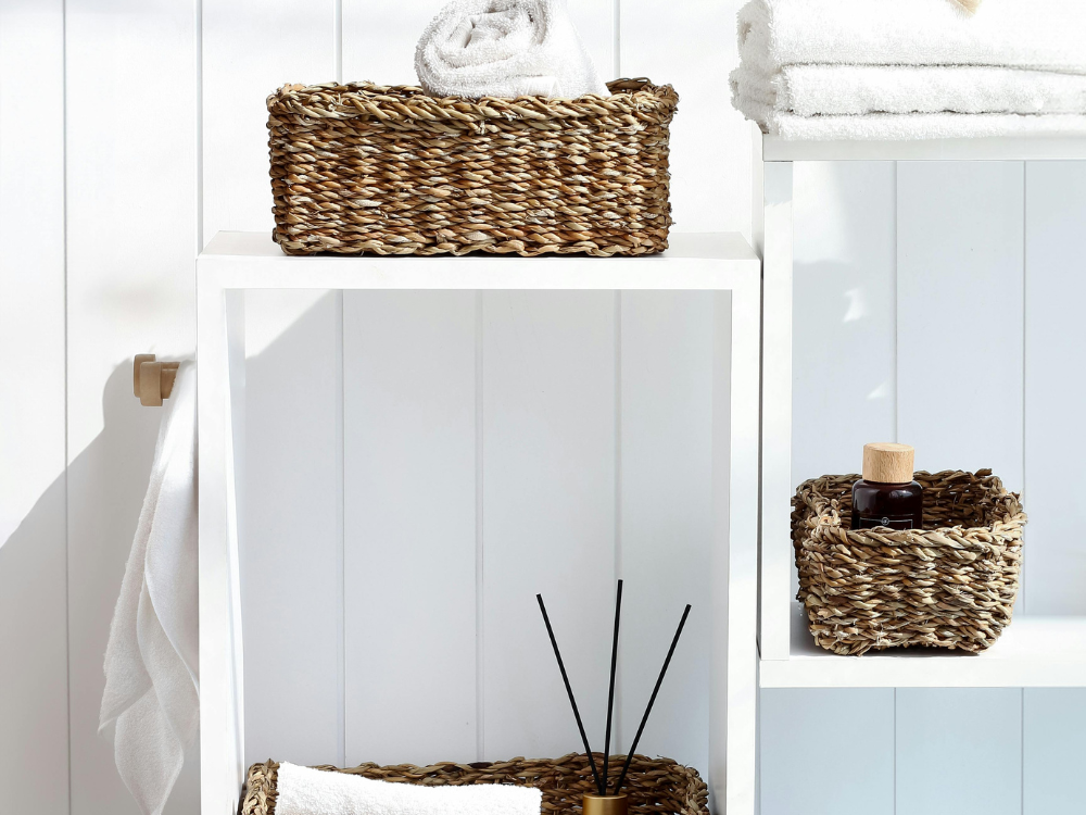 Woven baskets used for bathroom storage.